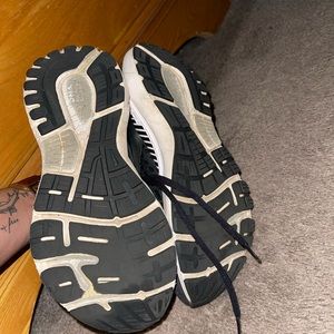 3 pairs of Brooks brand sneakers